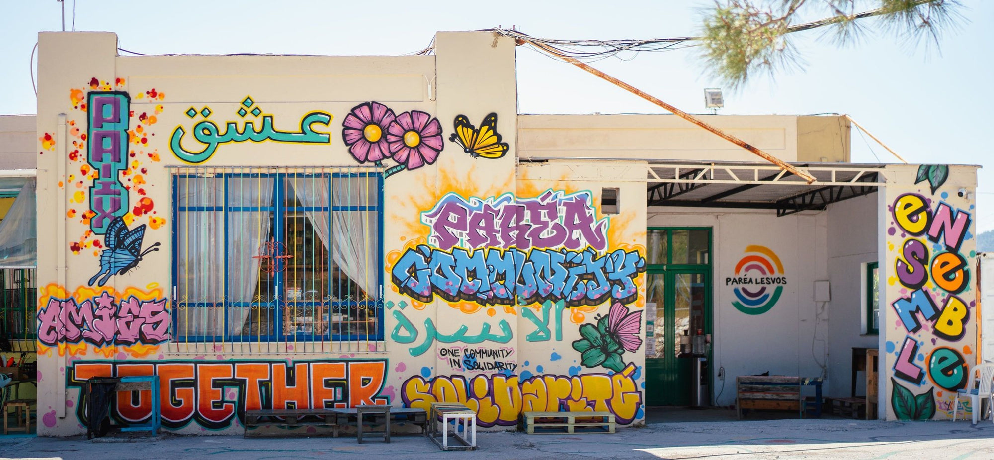 The Paréa Lesvos community centre, its walls covered in murals