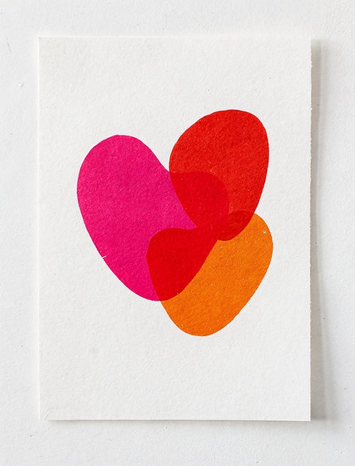 Habibi screen print: overlapping pink and orange ink shapes forming a heart (placeholder artwork)
