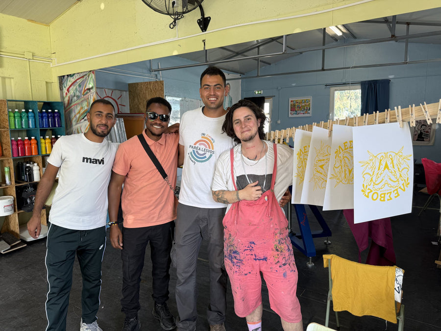 The Paréa Prints makers together in the studio, prints drying behind them